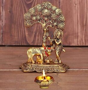 Metal Krishna with Cow Standing Under Tree Plying Flute with Kuber Diya Decorative Showpiece (Metal, Gold)