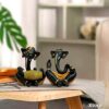 Resin Floating Ganesha Statues Decorative Showpiece | Spreads Positive Vibes (Pack of 2, Black & Yellow)