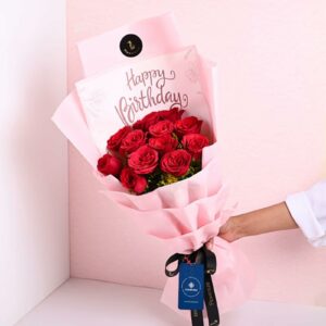 FlowerAura Fresh Live Flower Bouquet of 12 Red Roses In Happy Birthday Packing For Birthday Gift, Anniversary Gift, Wedding Gift, Congratulations Gift & Gift For Special Occasions (Same Day Delivery)